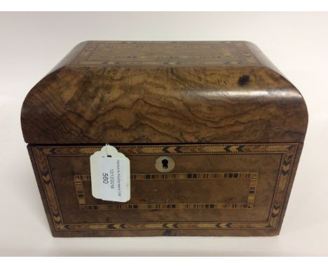 A Victorian walnut parquetry inlaid walnut tea caddy, the flattened dome top with two lidded compartments, 16cms wide