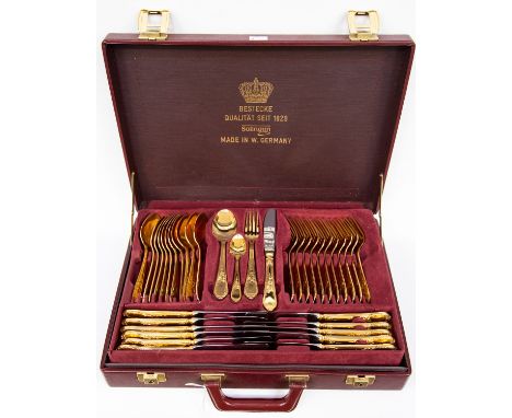 A canteen of cutlery, Bestecke gold plated two tray, 72 piece set, knives, forks, cake, dessert, ladle, butter and jam, RRP £