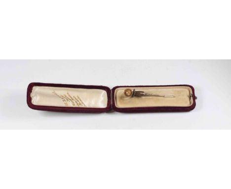 A Victorian 18ct gold stick pin, star set with a small diamond to the centre, length approx 55mm