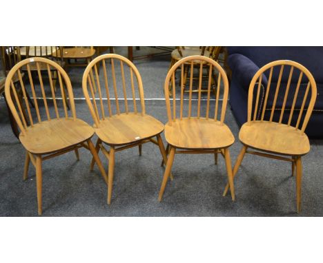 A set of four Ercol 370 Windsor chairs,  blonde, blue label