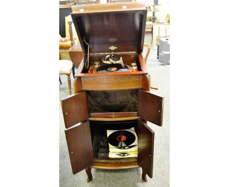 A Gilbert model No 52 Gramophone, freestanding mahogany cabinet, internal speaker horn, c. 1920; variety of approx. 30 vinyl 