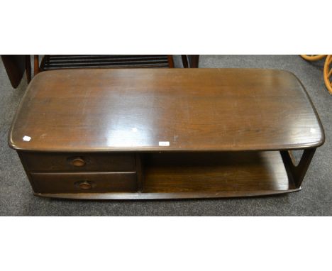 An Ercol Windsor 844 TV stand/coffee table, gold label