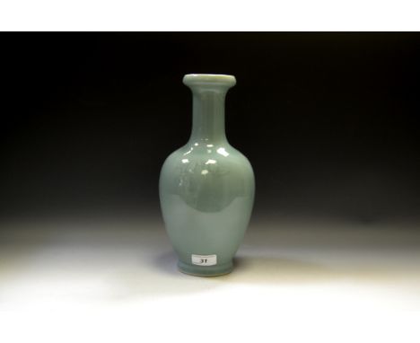 A Chinese baluster vase, in celadon, in light relief with stylised chrysanthemums, 31cm high, seal mark   Condition Report:  