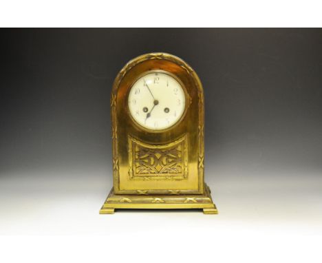 A Japanese Aesthetic movement brass timepiece, twin winding holes, enamel dial, Arabic numerals
