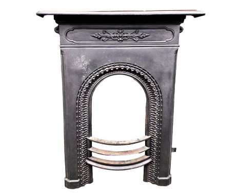 A Victorian black cast iron fire surround and grate, grate 28.5 by 20.5 by 11.5cm high, and guard, 38 by 9 by 13cm high. (2)