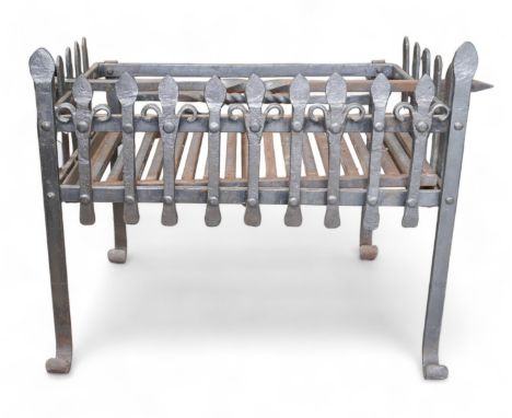 A fire basket and poker, with poker with rams head finial, the fire basket measures 60 by 48 by 52cm high, the poker is 75cm 