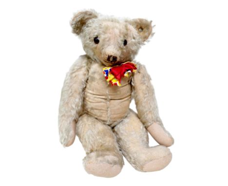 A vintage mohair Hygienic merrythought teddy bear, button to ear, 66cm tall.In worn, loved condition. 