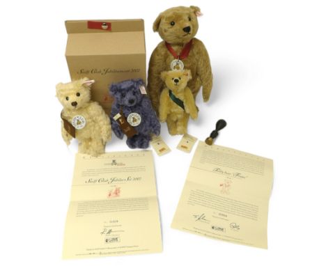 Collection of Steiff Club Collection Bears, comprising of two Steiff Club jubilee 2002 bears, both holding a copy of the club