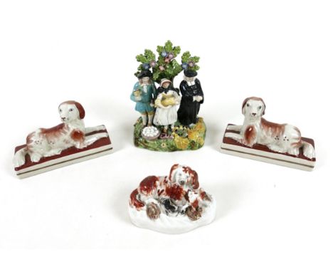 A group of Staffordshire ceramics, including 19th century Staffordshire pearlware figure group 'The Tithe Pig', modelled with