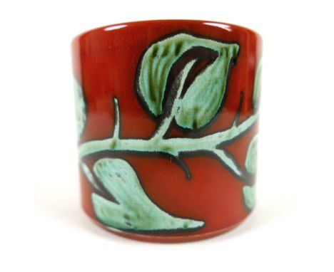 A Poole Delphis planter, 11.5cm diameter by 10.5cm tall.Some water marks to interior otherwise good. 