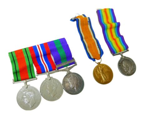 A WWI and a WWII medal group, comprising of a WWI War and Victory Medal, named 015543 PTE. E. SKILLARKER. A.O.C., three WWII 