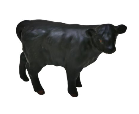 A Beswick figurine of an Aberdeen Angus calf model 1827A, in matt finish, 7.5cm high. 