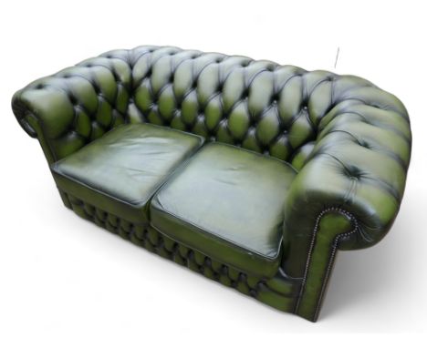 A modern green leather button back Chesterfield sofa, 153cm by 87cm by 72cm tall. 