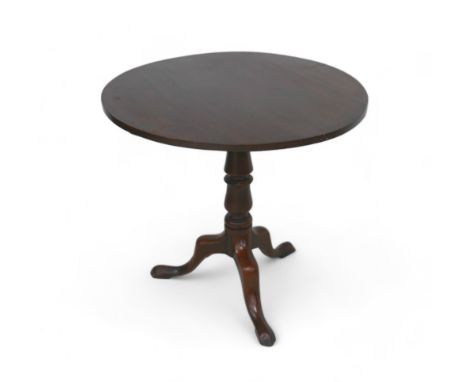 A Georgian mahogany tilt top side table on a tripod base, 78.5 by 78.5 by 76cm tall. 