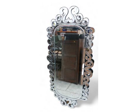 An oval modern Venetian style mirror 