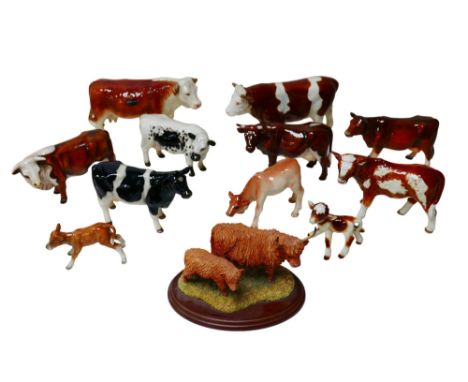 A collection of figurines modelled as cattle, including a Border Fine Arts figural group of Highland cow and calf B167, as we