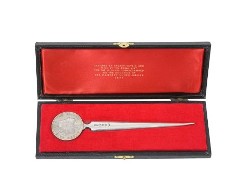 An Elizabeth II Parcel-Gilt Silver Paper-Knife,  by Stuart Devlin, London, 1977 to commemorate the silver jubilee of Queen El