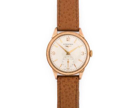 Longines: A 9 Carat Gold Wristwatch, signed Longines, 1956, (calibre 23Z) manual wound lever movement signed and numbered 955