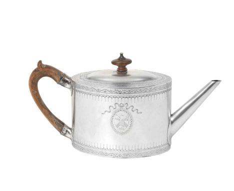 A George III Silver Teapot,  by James Young, London, 1784 oval and engraved with foliage, each side further engraved with a r