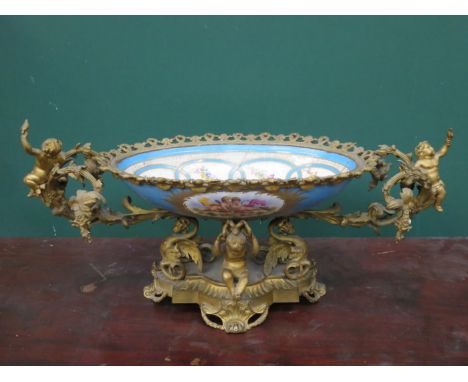 CONTINENTAL STYLE HANDPAINTED AND GILDED FLORAL DECORATED CERAMIC TABLE CENTREPIECE, MOUNTED ON AN ORNATE GILT STAND DECORATE