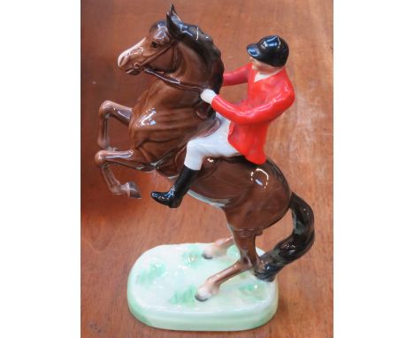 BESWICK GLAZED CERAMIC FIGURE OF A HUNTSMAN ON A REARING HORSE, No 868, APPROXIMATELY 26cm HIGH 