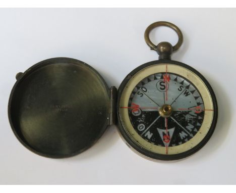 DECORATIVE MILITARY STYLE BRASS CASED FIELD COMPASS WITH MOTHER OF PEARL DECORATED DIAL, BY ED MESSIER, BERLIN 
