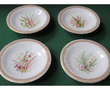 SET OF FOUR HANDPAINTED AND GILDED ROYAL WORCESTER CERAMIC CAKE PLATES 