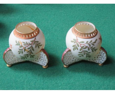 PAIR OF WORCESTER HANDPAINTED AND GILDED PIERCEWORK DECORATED CERAMIC VASES (AT FAULT) 