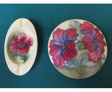 MOORCROFT TUBE LINED AND FLORAL DECORATED CERAMIC COVER AND SAUCERS 