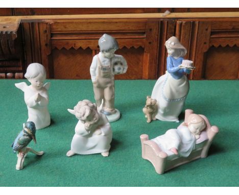 THREE NAO GLAZED CERAMIC FIGURES, TWO LLADRO UNGLAZED FIGURES AND GOEBELS KINGFISHER 