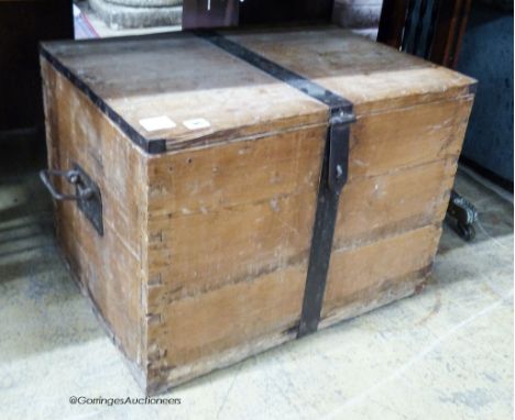   A Victorian iron bound pine trunk, length 63cm, depth 47cm, height 44cm