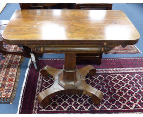   An early Victorian rosewood veneered folding card table, width 90cm, depth 45cm, height 74cm