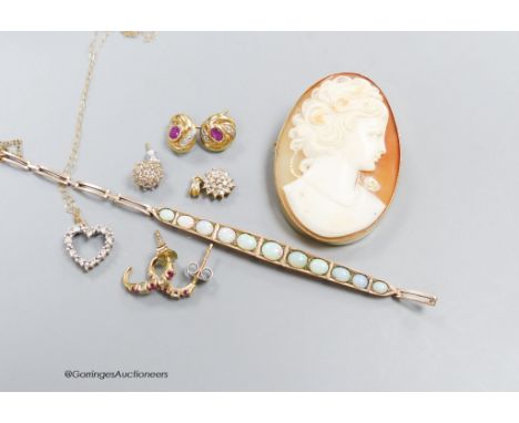   A gold and white opal bracelet (a.f), a cameo brooch and sundry gem set earrings and pendants