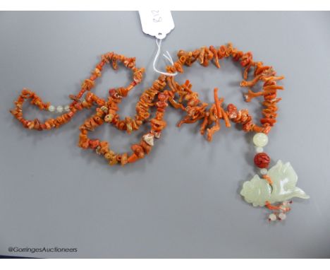   A jagged coral bead necklace, with jade pendant, carved as a fish, necklace approx. 88cm, fish length 66mm, gross weight 11
