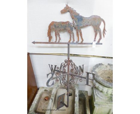   A wrought iron horse weather vane, width 85cm, height 138cm