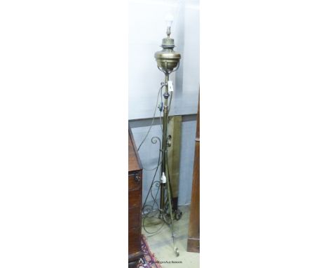   An Edwardian brass telescopic oil lamp standard converted to electricity