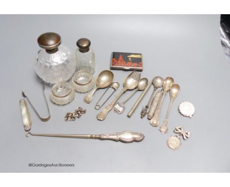   Two silver-mounted toilet bottles, a pair of silver-mounted salts, an enamelled silver box (a.f.), a caddy spoon, etc.