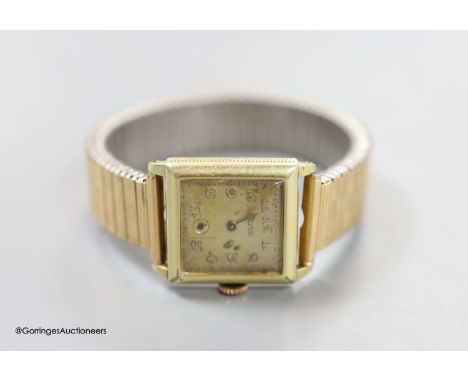   A gentleman's gold filled Gruen manual wind wrist watch, on associated flexible bracelet.