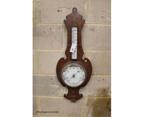   A late 19th century mahogany and inlaid wheel barometer / thermometer, height 84cm