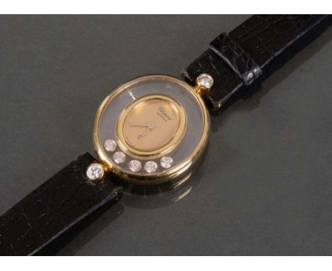 Damenarmbanduhr mit Quartzwerk. Marke „Chopard - Happy Diamonds“ ca. 1994. Ovales Gehäuse und Schließe 18 ct Gelbgold mit Kro