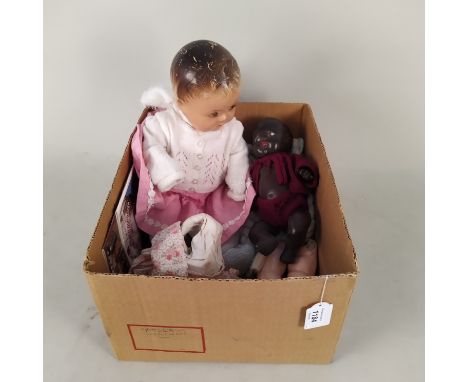 A vintage hard plastic doll with blinking eyes, a 'reliable' Canadian made doll plus a selection of doll parts