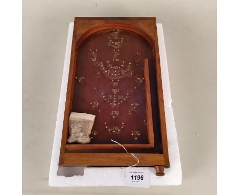 A wooden Bagatelle game