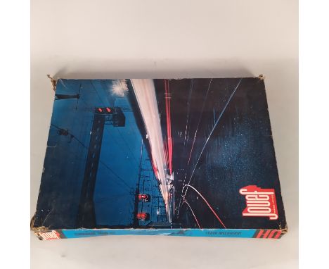A vintage boxed Jouef P1402 clockwork train set (possibly missing a small car and box with wear)