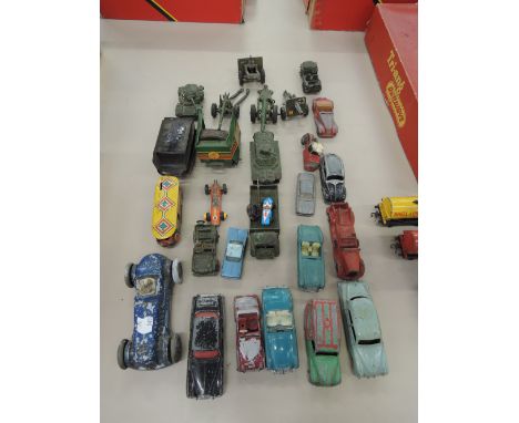 A selection of die-cast and tin plate vehicles including a Gaiety Toy clockwork racing car, Corgi, Dinky etc