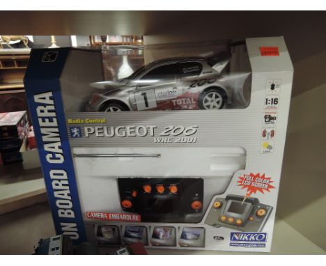 A Nikko radio controller Peugeot 206 WRC 2001 model car with on board camera