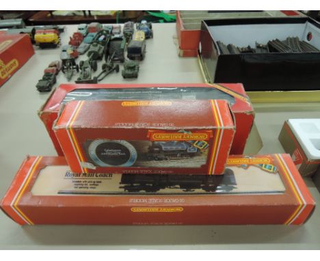 A Hornby OO gauge 0-4-0 tank engine, Royal Mail coach R416 and breakdown crane with trucks, all boxed 