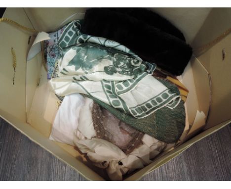 A Harrods hat box containing vintage bead and cloth evening bags, vintage hats, handkerchiefs and head scarves including Trot