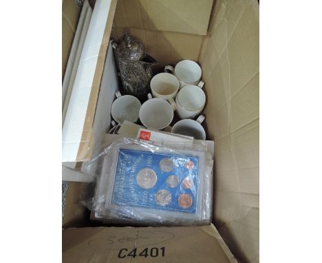A selection of first day cover stamps, proof coin sets and coronation ware