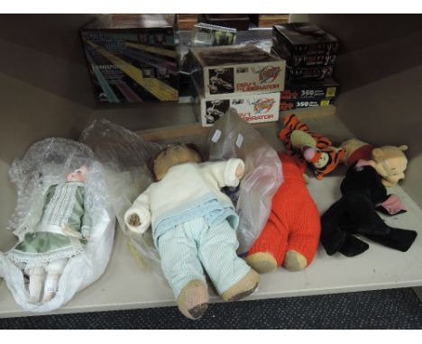 Six vintage and modern Teddy bears and dolls including mid 20th century straw filled jointed body bears