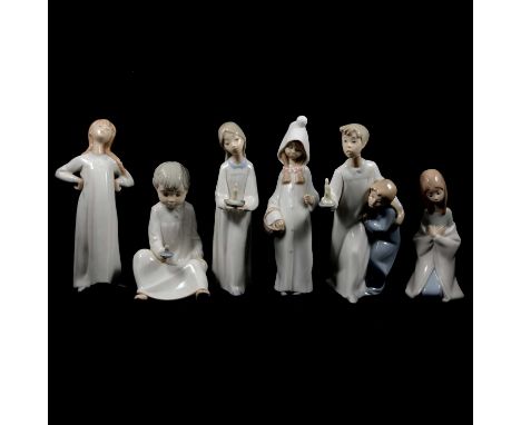 Five Lladro figures of children in nightgowns, and another similar Spanish ceramic figure.Qty: 6Condition report:Ome figure i